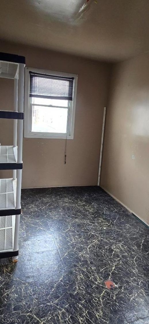 449 East 26th Street Paterson, NJ 07514 - Photo 9 of 9 a room with window
