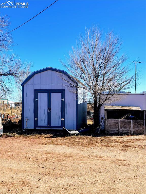 24405 Handle Road Calhan, CO 80808 - Photo 14 of 30 a view of a house with a yard