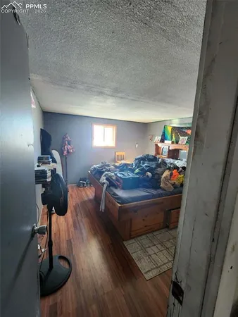 a room with furniture and gym equipment