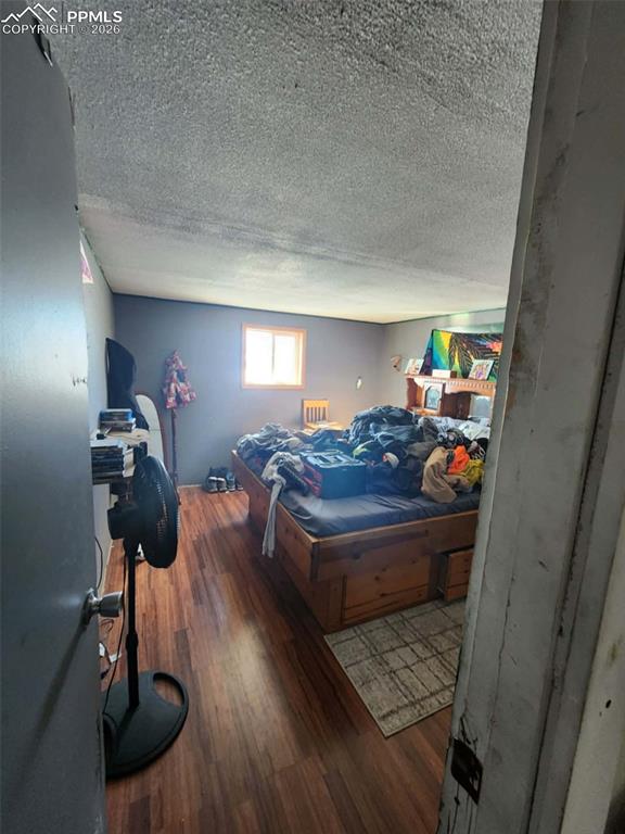 24405 Handle Road Calhan, CO 80808 - Photo 19 of 30 a room with furniture and gym equipment