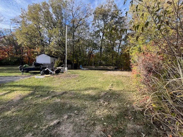 a car parked in the middle of a field
