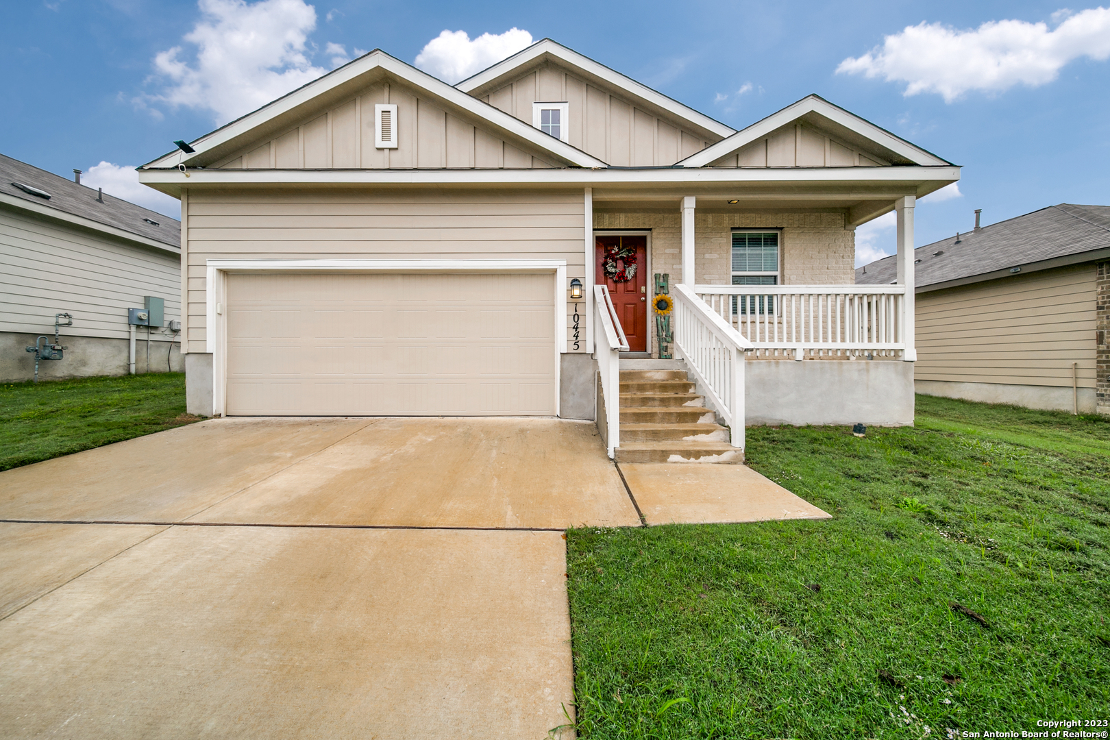 10445 Margarita Loop Converse, TX 78109 - Photo 1 of 1 a front view of a house with a yard and garage