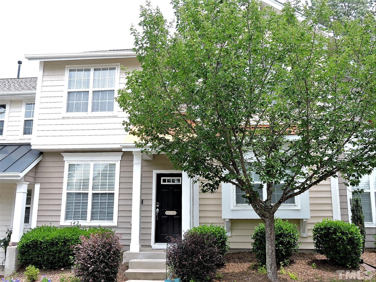3811 Ramblewood Avenue Durham, NC 27713 - Photo 2 of 29 a front view of a house with garden