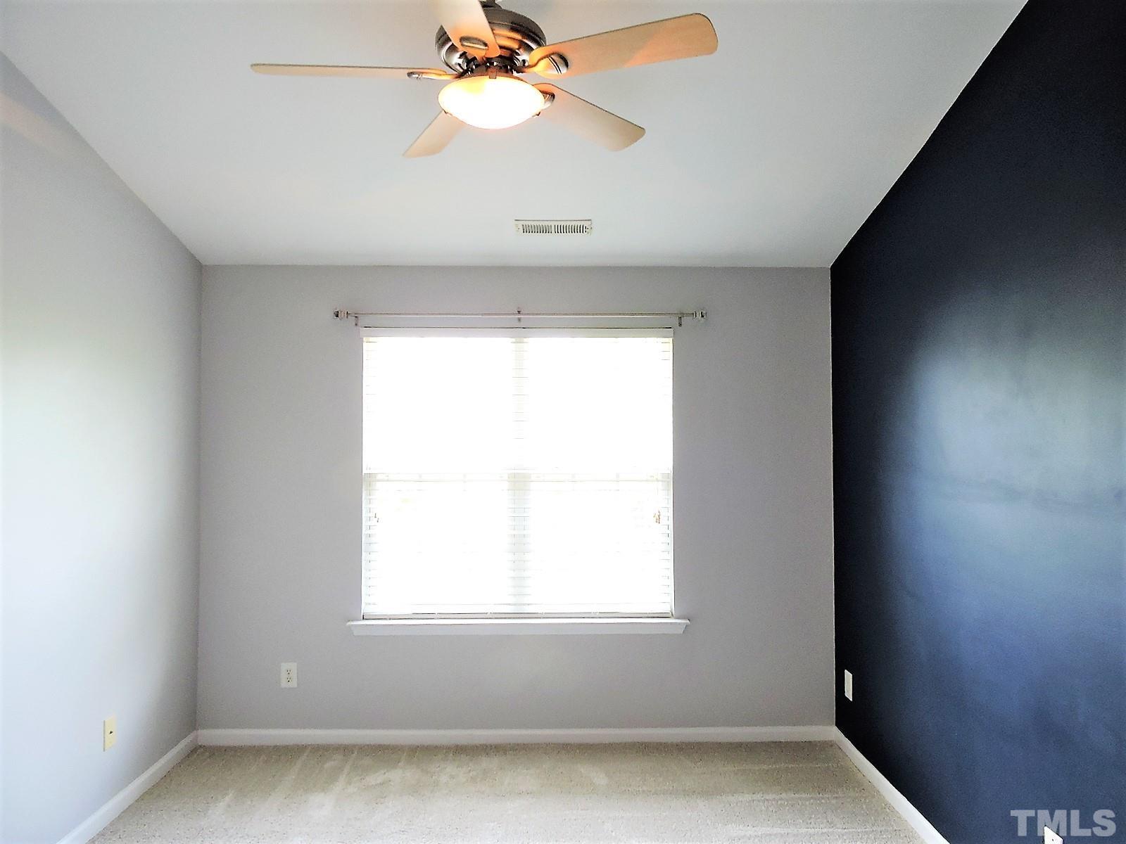 3811 Ramblewood Avenue Durham, NC 27713 - Photo 22 of 29 an empty room with a window