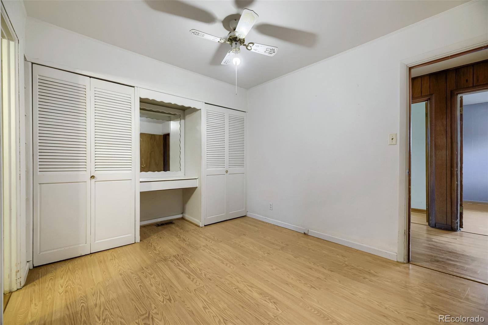 1521 Ruth Drive Thornton, CO 80229 - Photo 11 of 23 a view of an empty room with a window