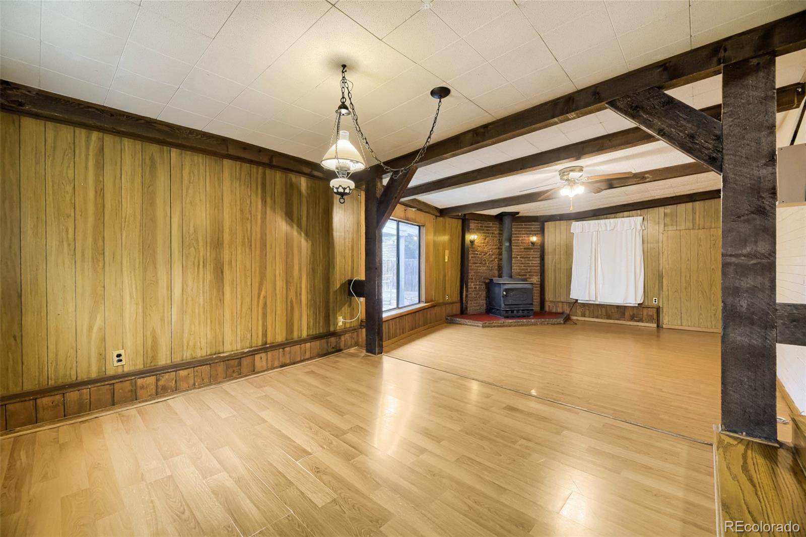 1521 Ruth Drive Thornton, CO 80229 - Photo 7 of 23 a view of an empty room with a window