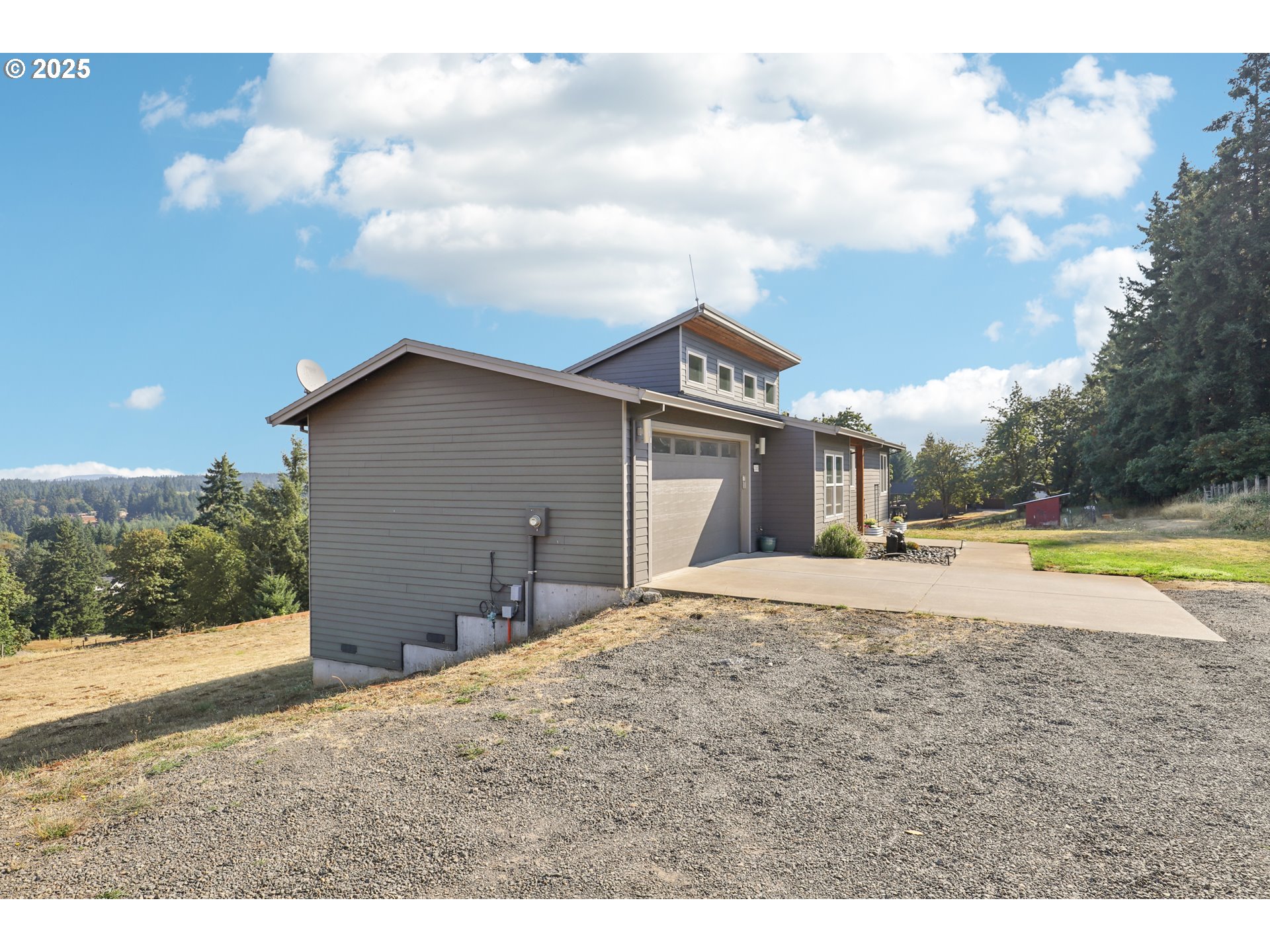 13005 South Casto Road Oregon City, OR 97045 - Photo 2 of 43 a view of house with yard and entertaining space