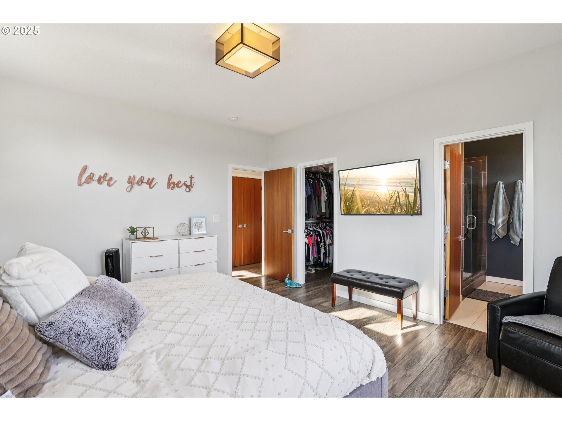13005 South Casto Road Oregon City, OR 97045 - Photo 21 of 43 a bedroom with a bed and a painting on the wall
