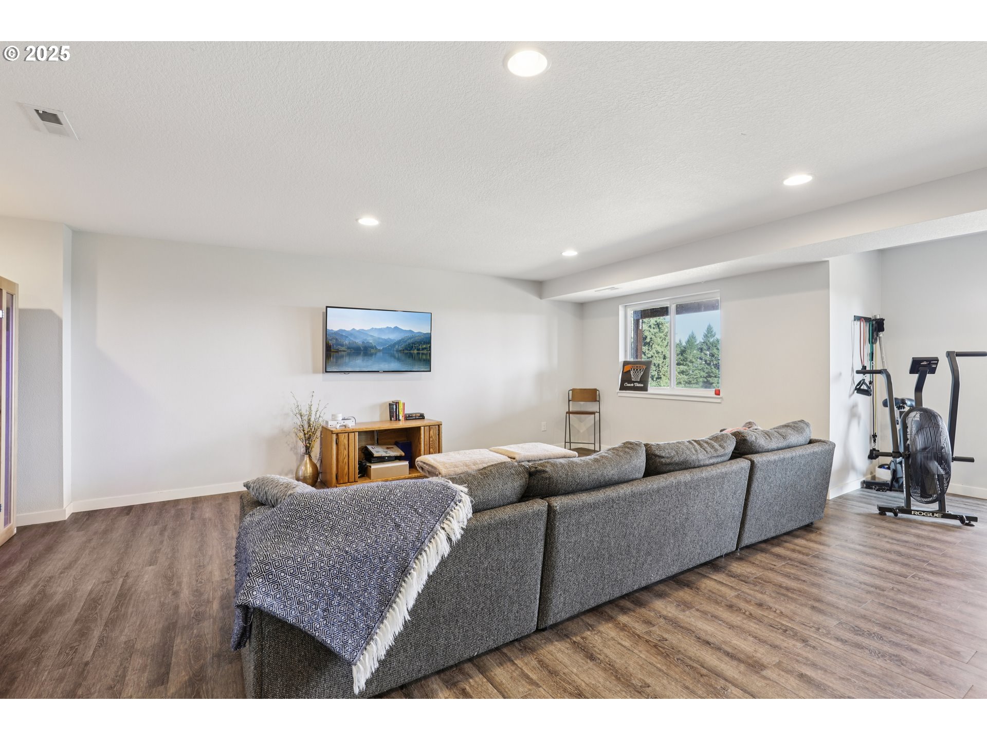 13005 South Casto Road Oregon City, OR 97045 - Photo 31 of 43 a living room with furniture and a flat screen tv