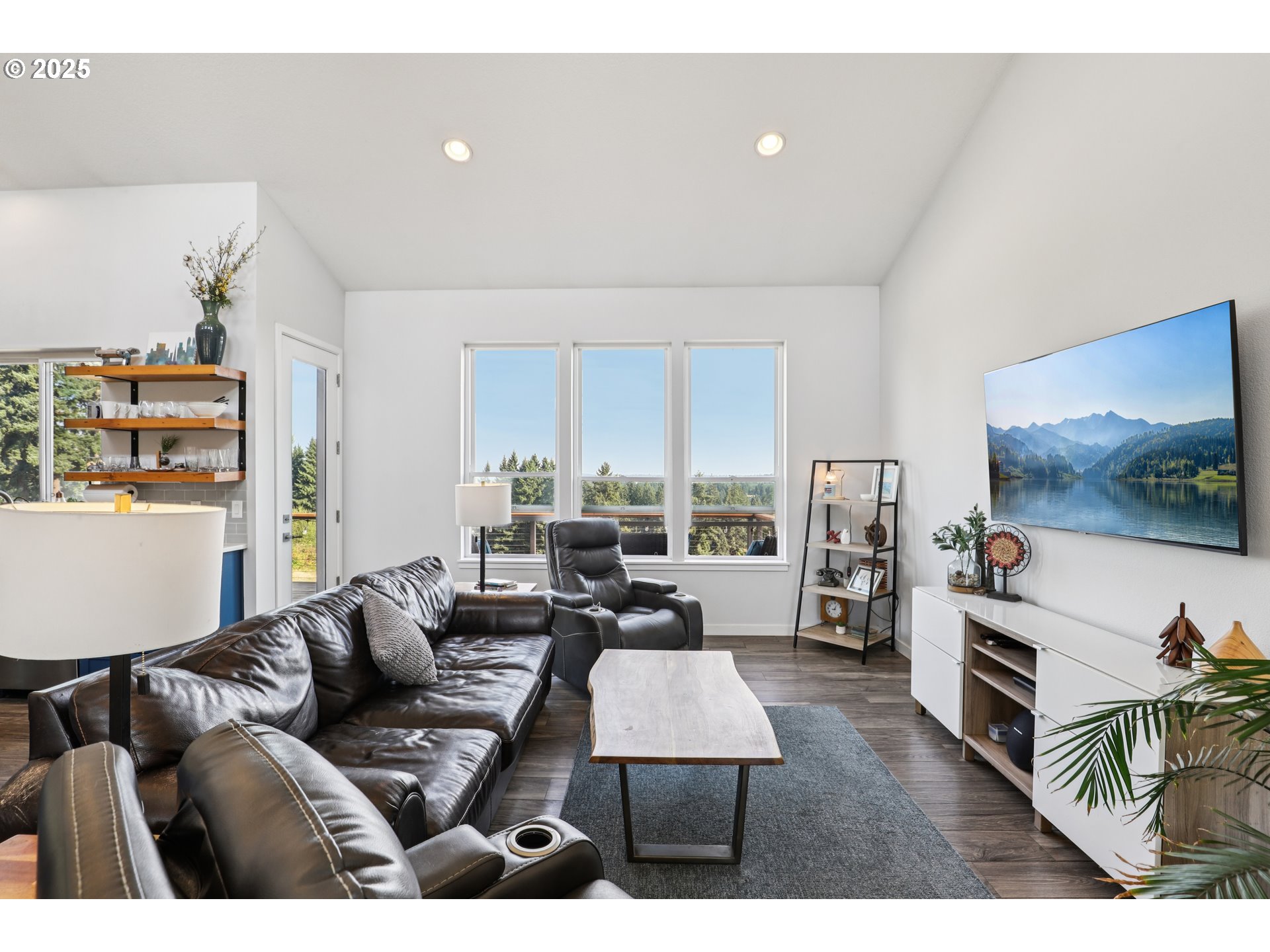 13005 South Casto Road Oregon City, OR 97045 - Photo 10 of 43 a living room with furniture and a flat screen tv