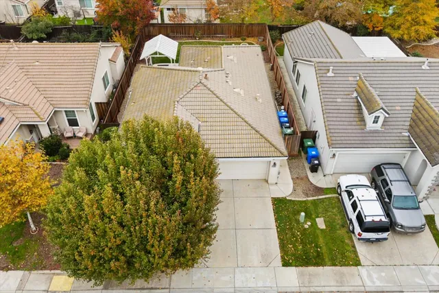 a view of a patio with couches and potted plants