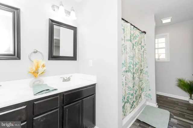 a view of a hallway with washer and dryer