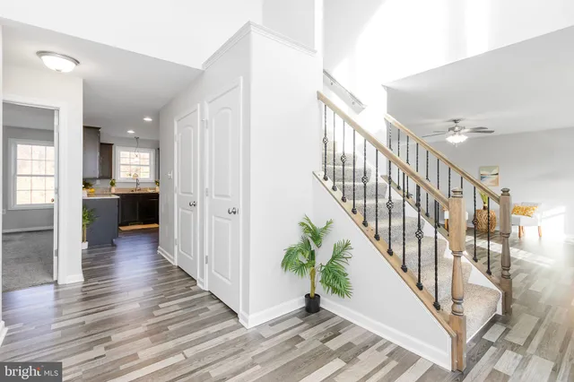 a bedroom with a bed and a lamp