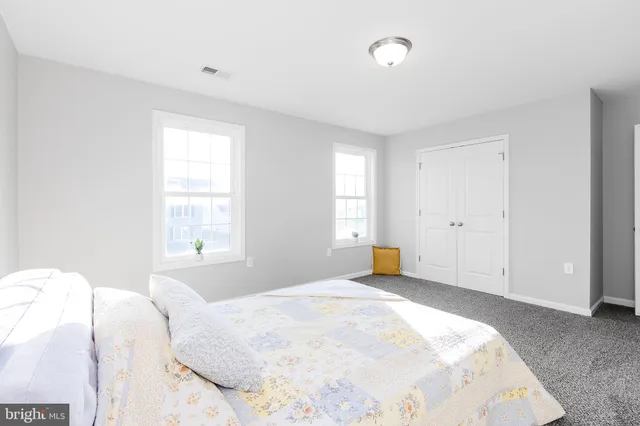 a view of room with furniture and a window