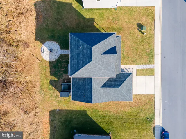 a house view with a backyard space