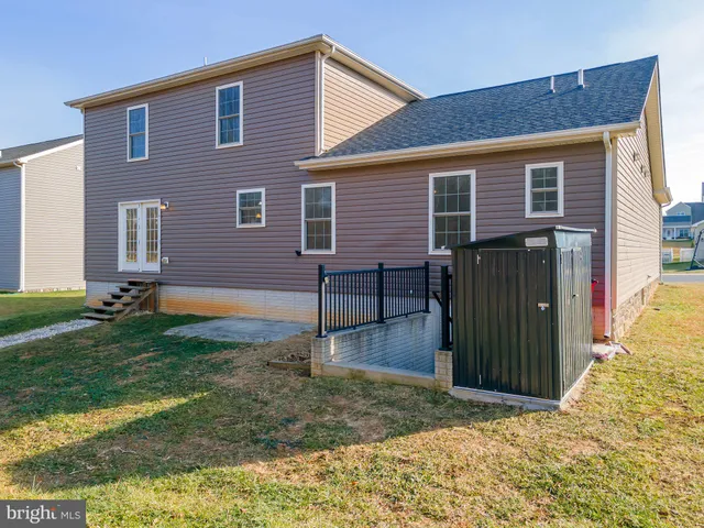 a view of house with a swimming pool