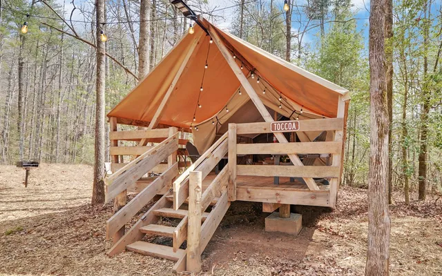 a bedroom with furniture and windows