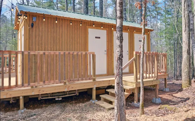a kitchen with stainless steel appliances granite countertop a stove and a microwave
