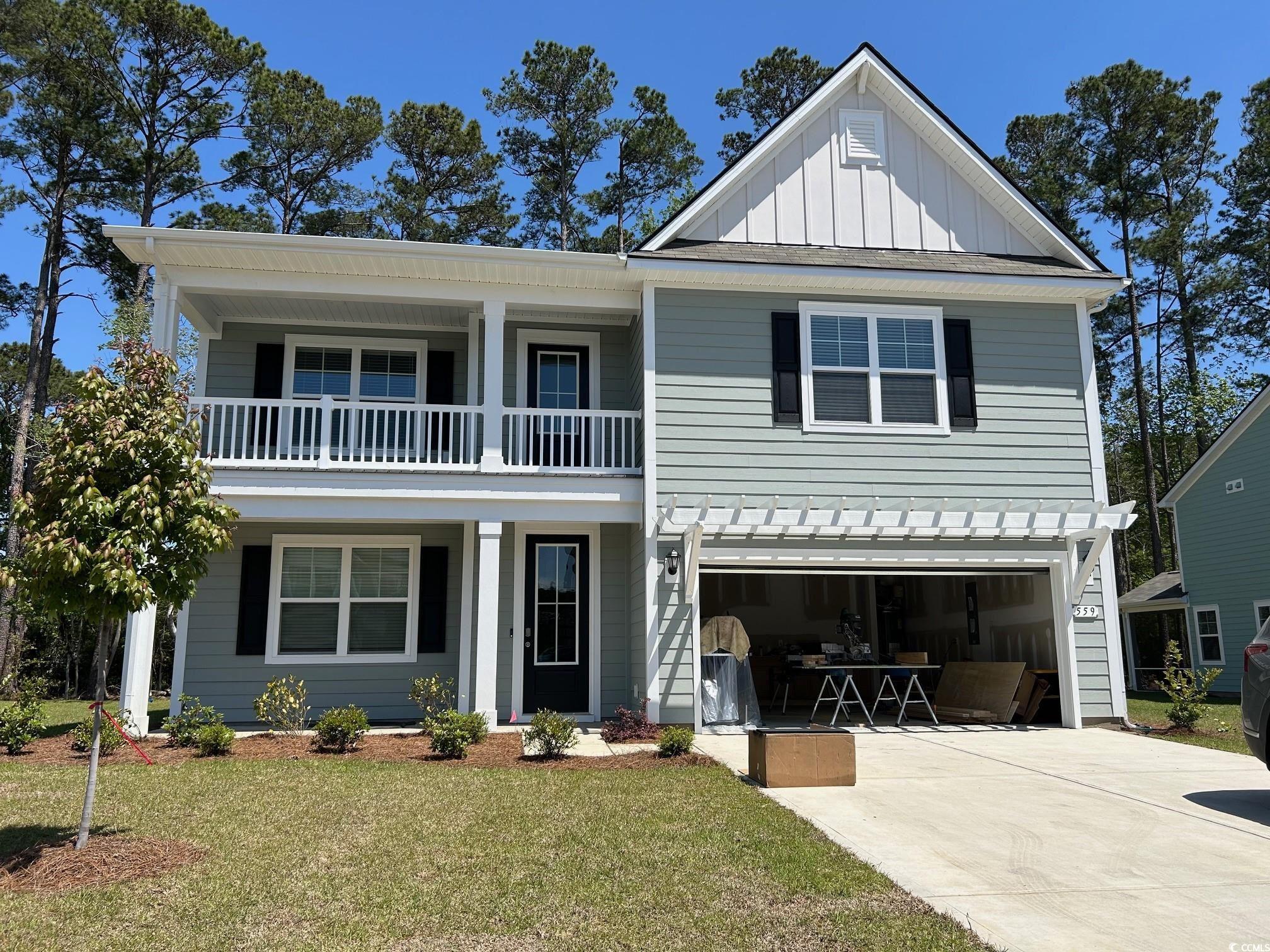 559 Haven View Way Murrells Inlet, SC 29576 - Photo 1 of 16 View of front of home featuring an attached garage