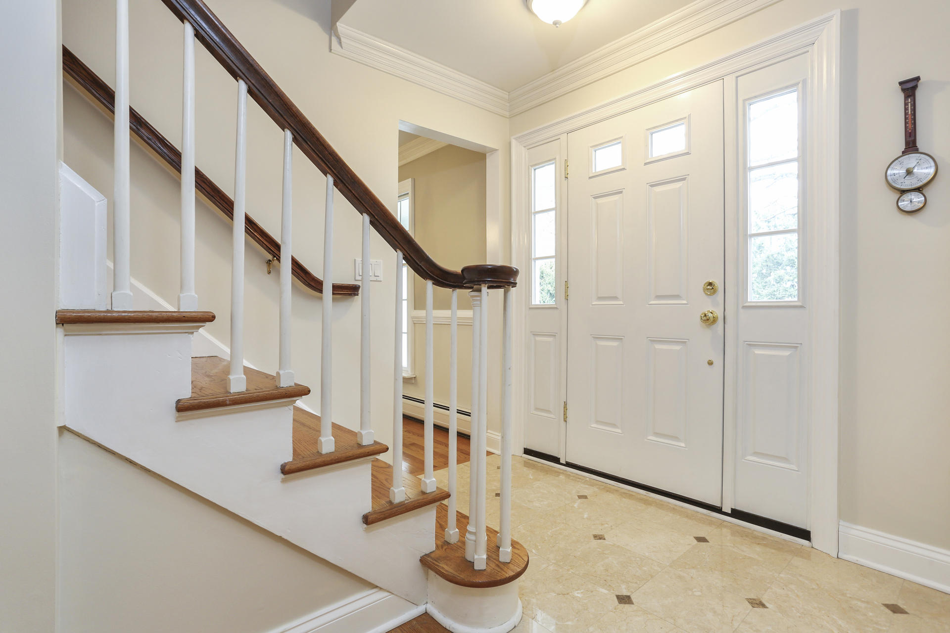 19 Middlesex Road Darien, CT 06820 - Photo 2 of 37 a view of entryway with kitchen and chandelier