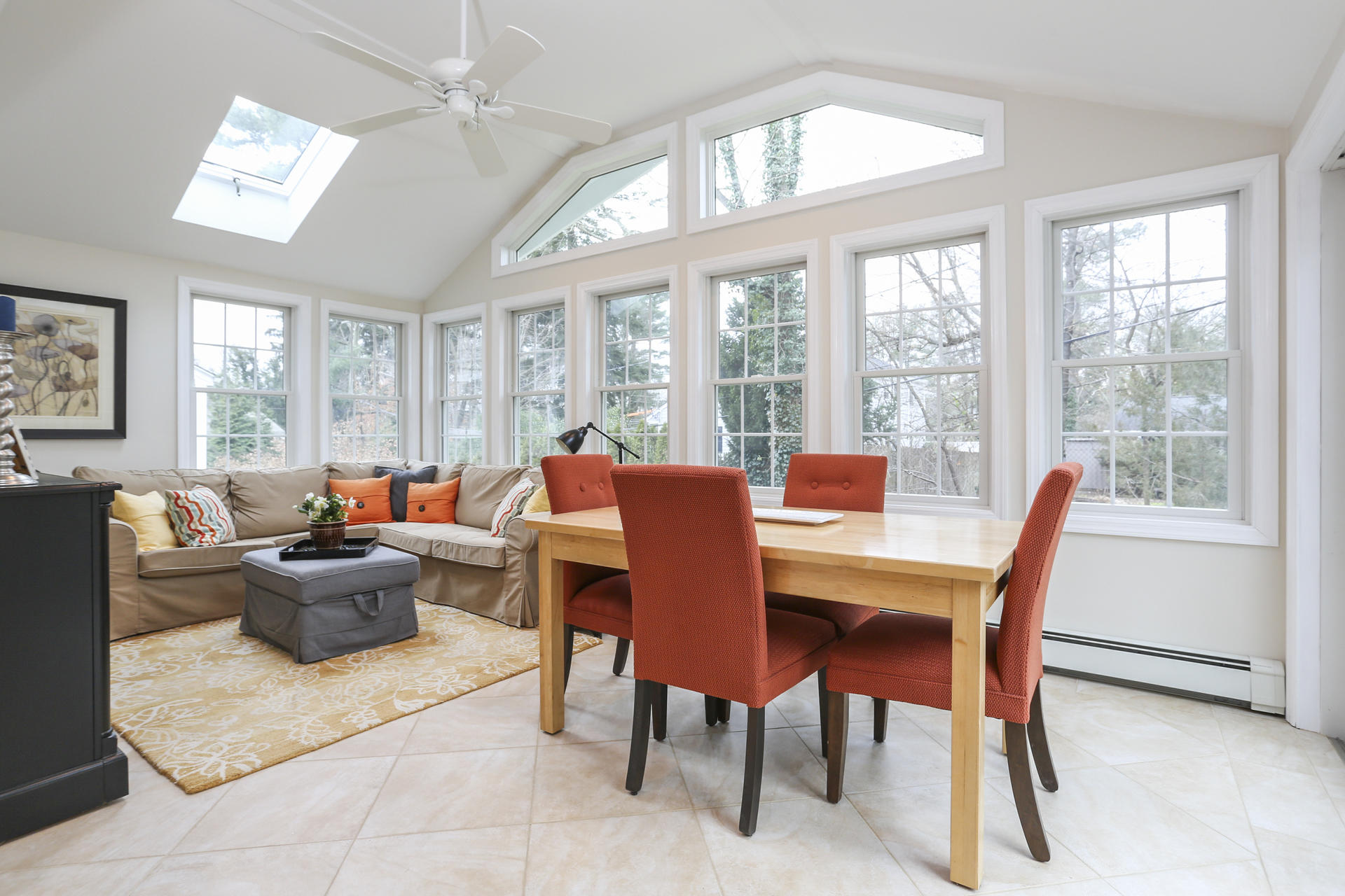 19 Middlesex Road Darien, CT 06820 - Photo 11 of 37 a dining room with furniture a large window and a chandelier