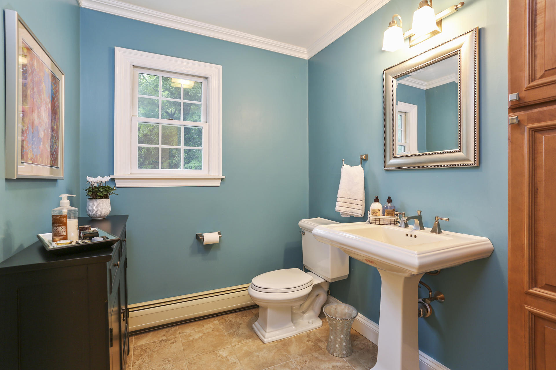 19 Middlesex Road Darien, CT 06820 - Photo 15 of 37 a bathroom with a toilet sink and mirror
