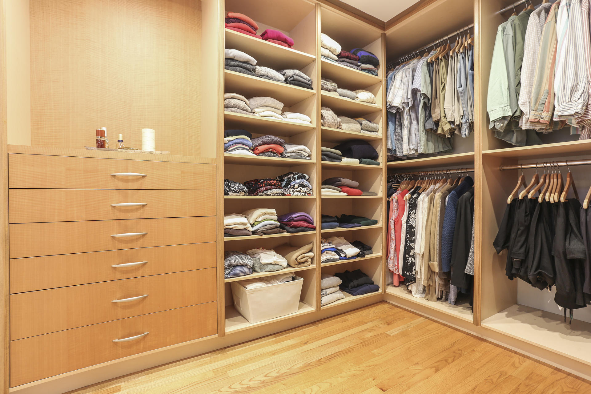 19 Middlesex Road Darien, CT 06820 - Photo 20 of 37 a view of walk in closet with clothes and shoes