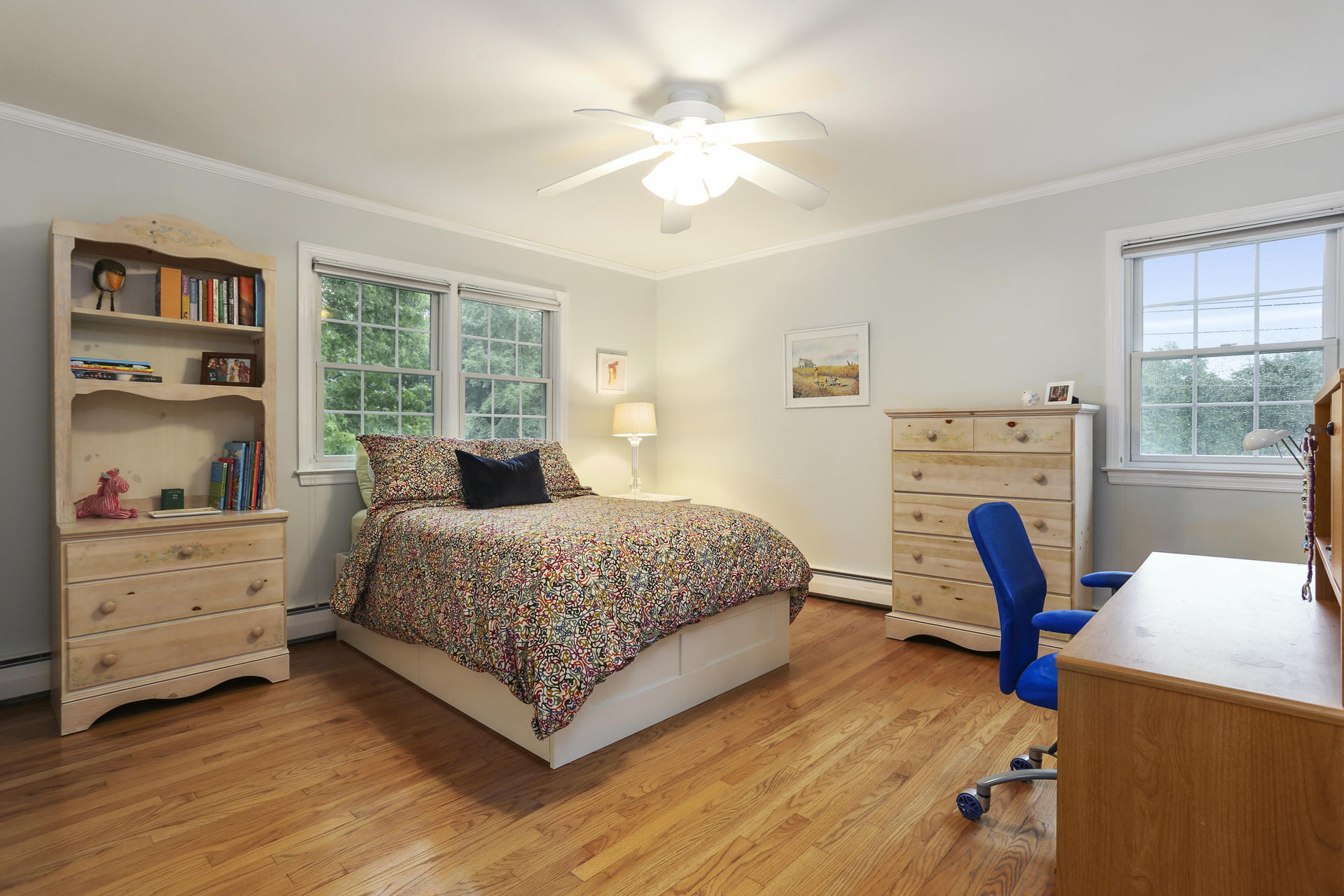 19 Middlesex Road Darien, CT 06820 - Photo 24 of 37 a bedroom with a bed and a chair