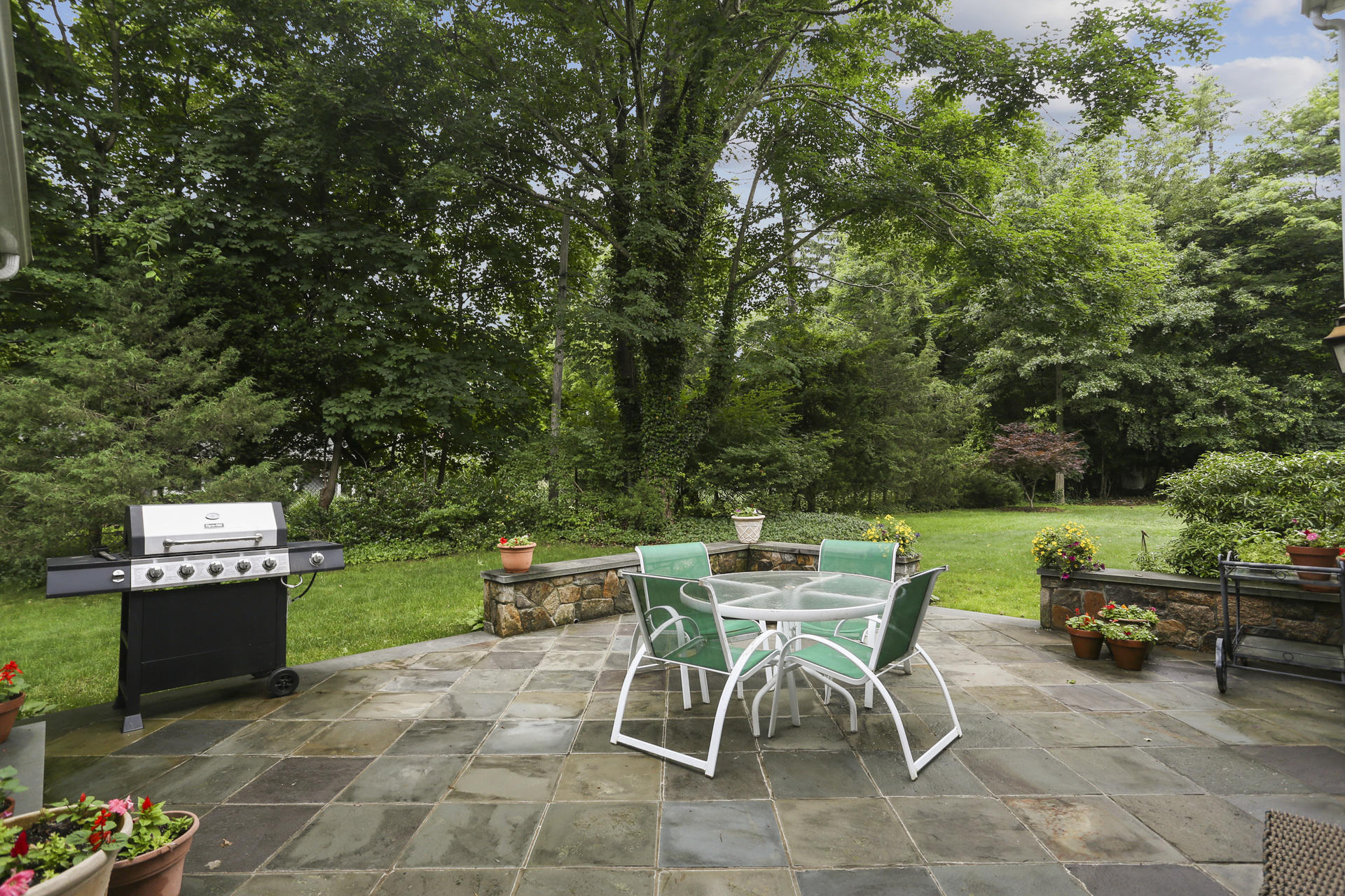 19 Middlesex Road Darien, CT 06820 - Photo 30 of 37 a view of a chairs and table in the patio