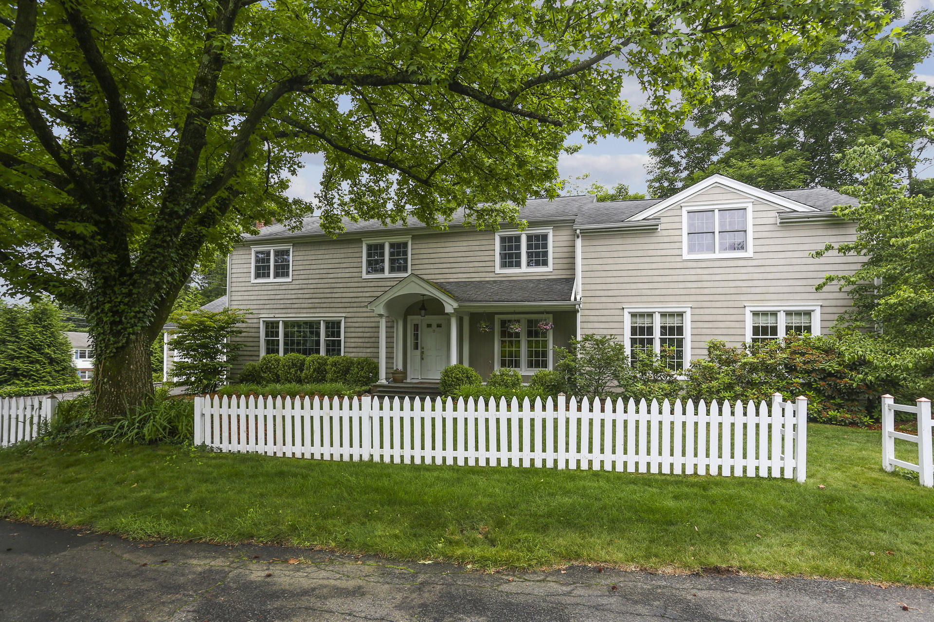 19 Middlesex Road Darien, CT 06820 - Photo 33 of 37 a front view of a house with a garden
