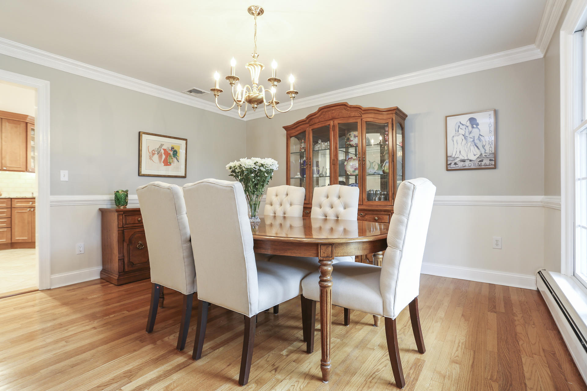 19 Middlesex Road Darien, CT 06820 - Photo 5 of 37 a view of a dining room with furniture wooden floor and chandelier