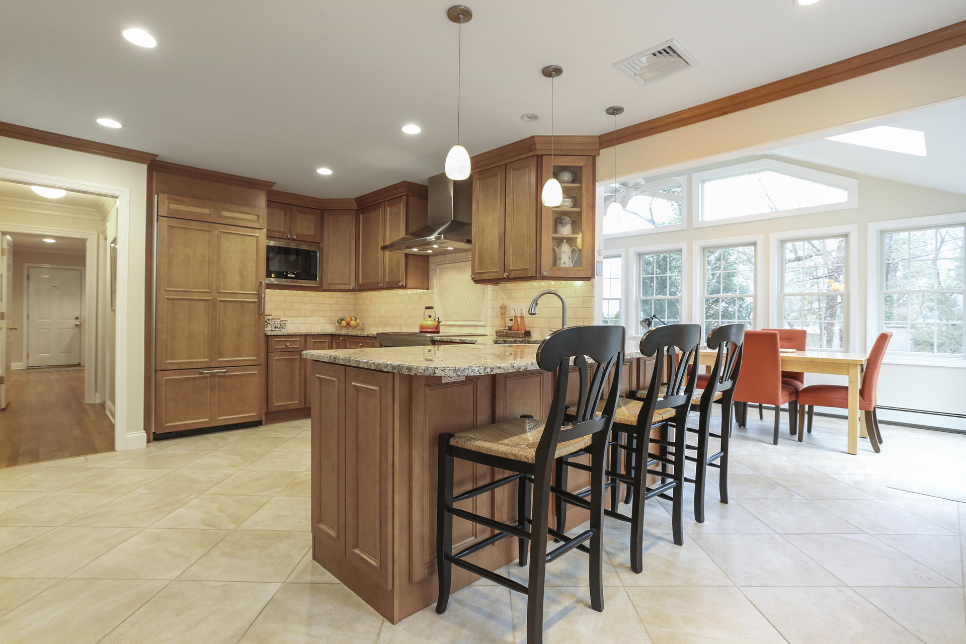 19 Middlesex Road Darien, CT 06820 - Photo 7 of 37 a kitchen with granite countertop a table and chairs