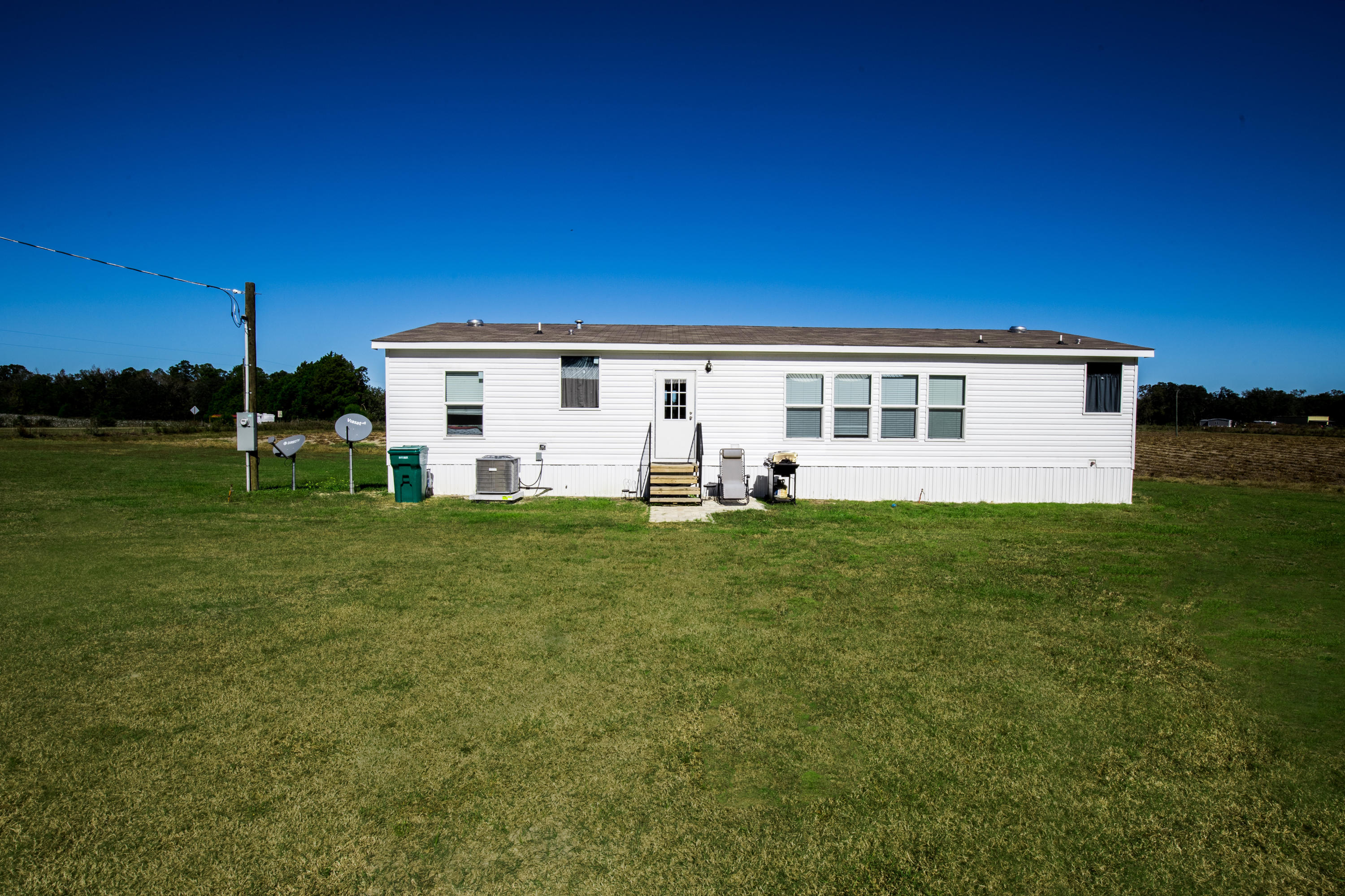 5133 Creek Road Vernon, FL 32462 - Photo 3 of 36 a view of a house with backyard