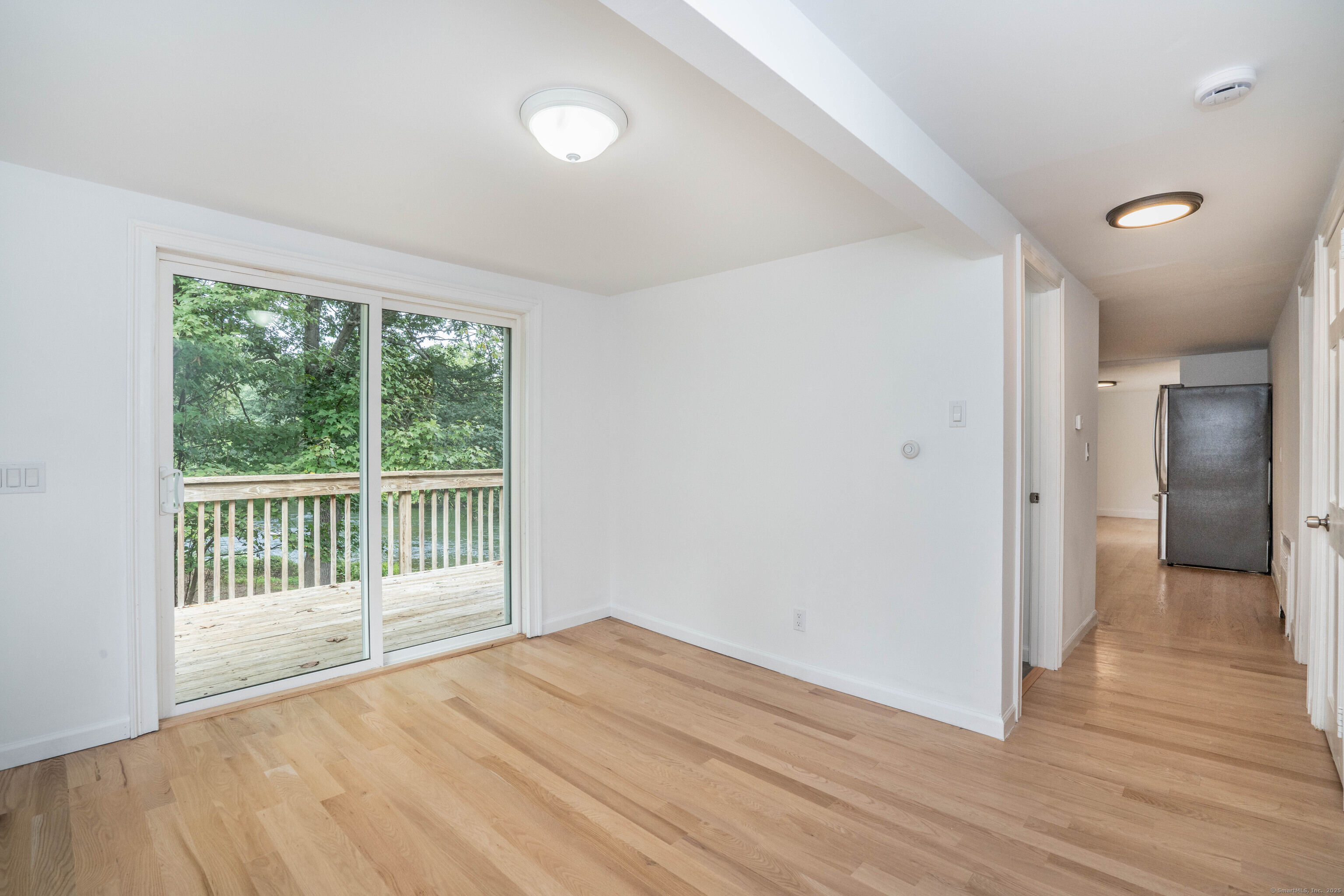 14 Main St Extension Simsbury, CT 06081 - Photo 16 of 39 wooden floor in an empty room