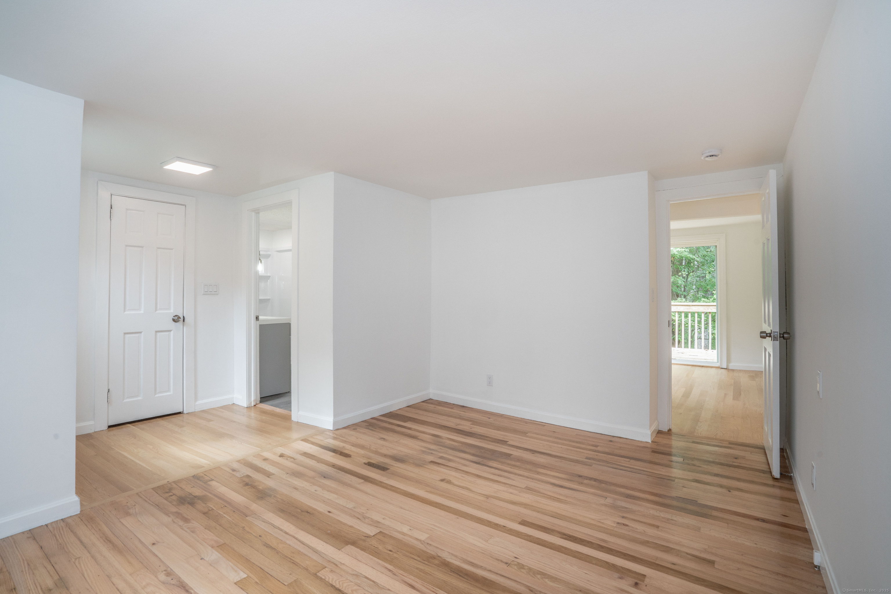 14 Main St Extension Simsbury, CT 06081 - Photo 19 of 39 a view of empty room with wooden floor