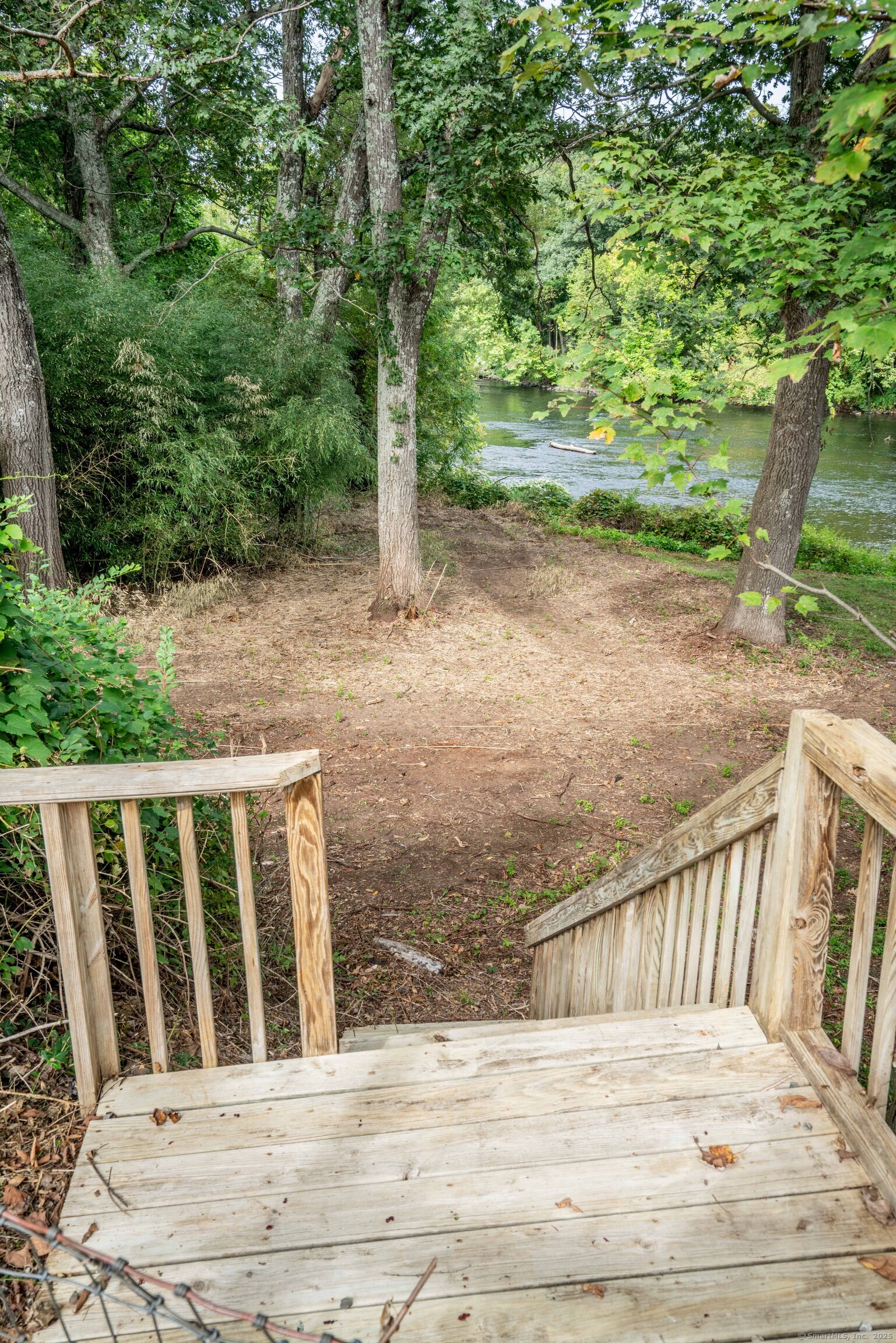 14 Main St Extension Simsbury, CT 06081 - Photo 2 of 39 a view of stairs and yard