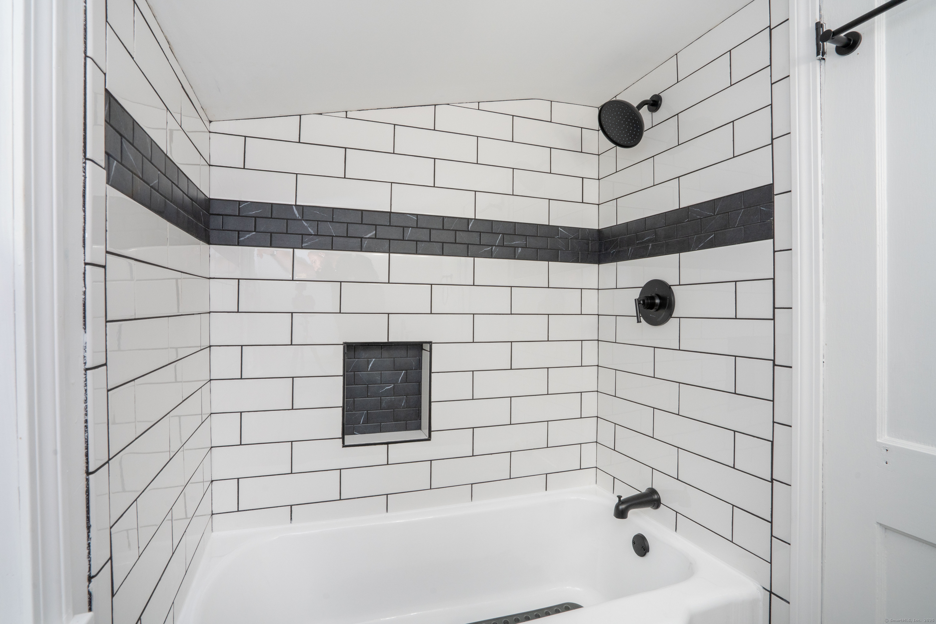 14 Main St Extension Simsbury, CT 06081 - Photo 26 of 39 a bathroom with a bathtub and shower