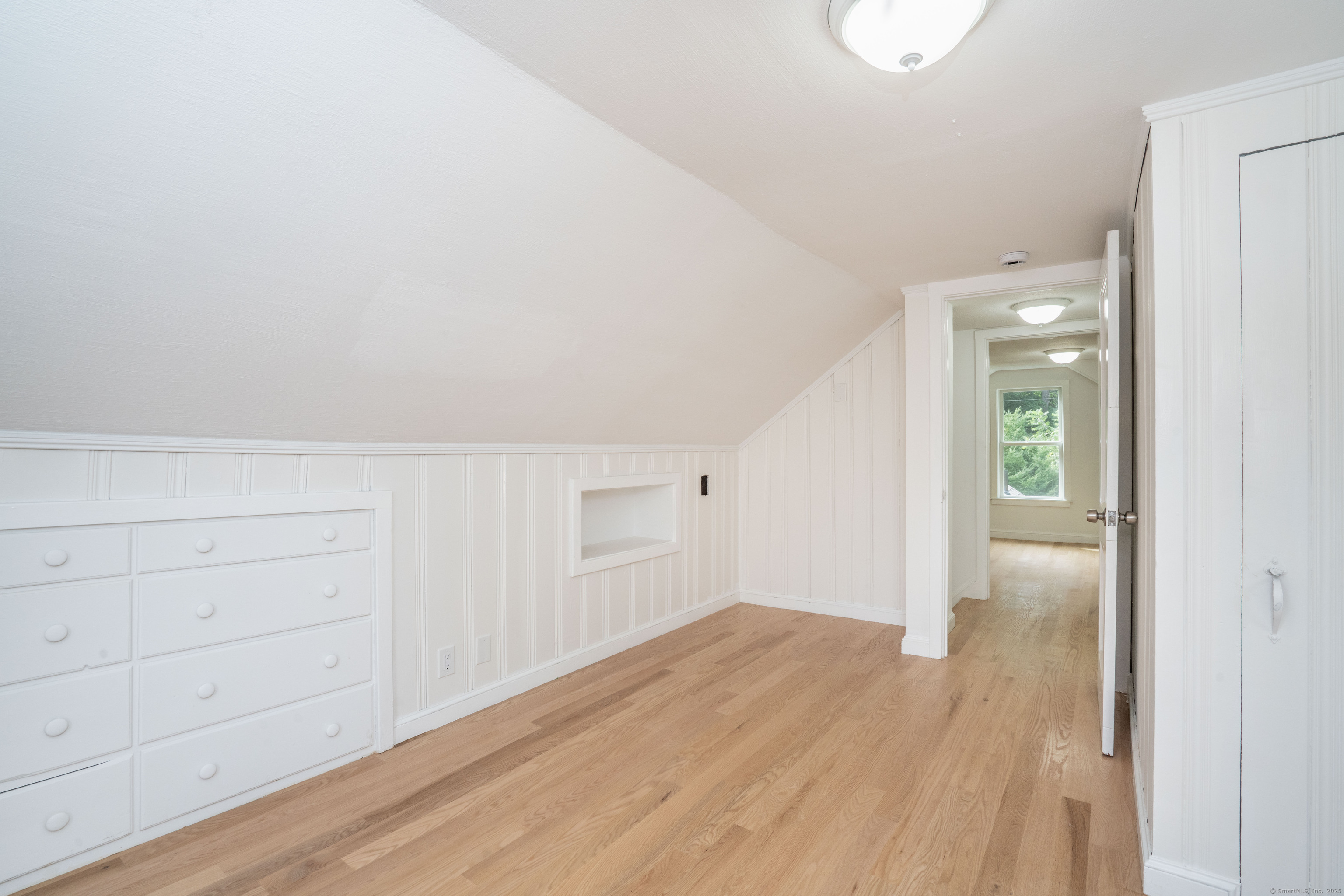 14 Main St Extension Simsbury, CT 06081 - Photo 27 of 39 wooden floor in an empty room