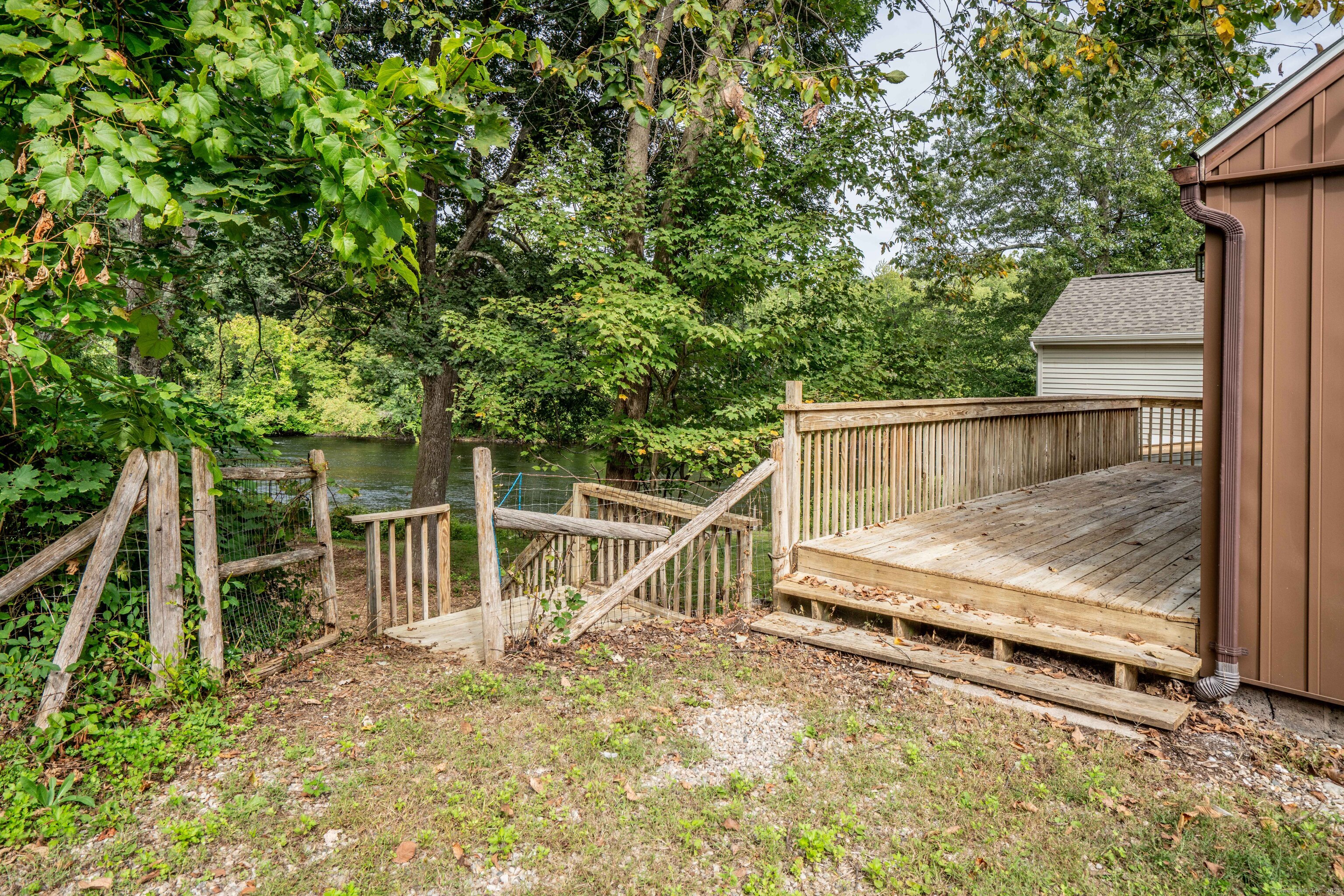 14 Main St Extension Simsbury, CT 06081 - Photo 33 of 39 a view of backyard with deck and wooden floor