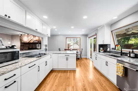 a large kitchen with cabinets