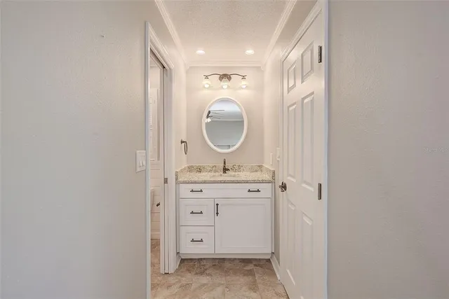 a living room with furniture large window and a flat screen tv