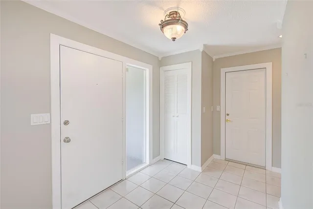 a view of a kitchen with a sink and a window