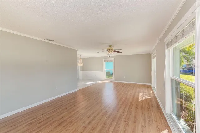 a kitchen with granite countertop a stove and a refrigerator