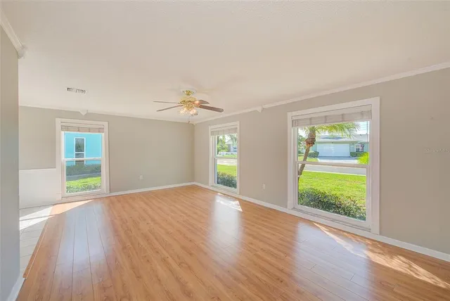 a kitchen with granite countertop a sink and a stove