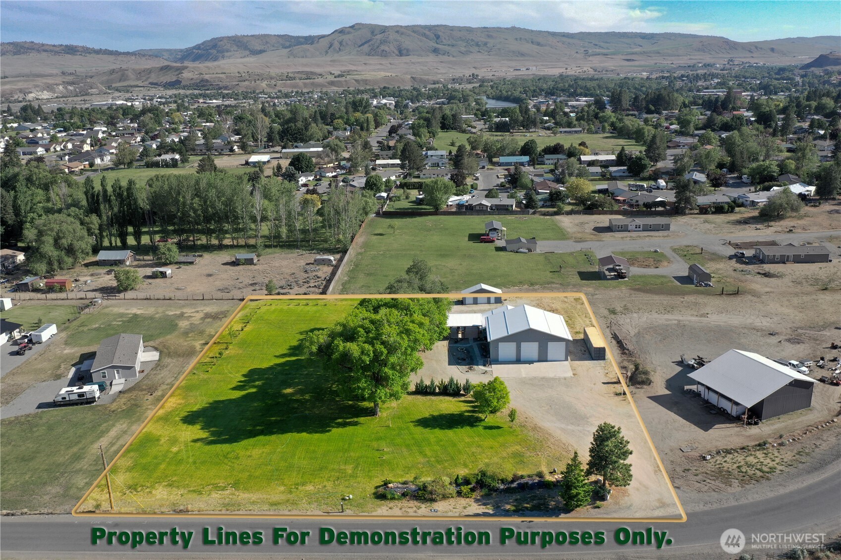 46 Shumway Road Omak, WA 98841 - Photo 3 of 40 an aerial view of a house with a garden