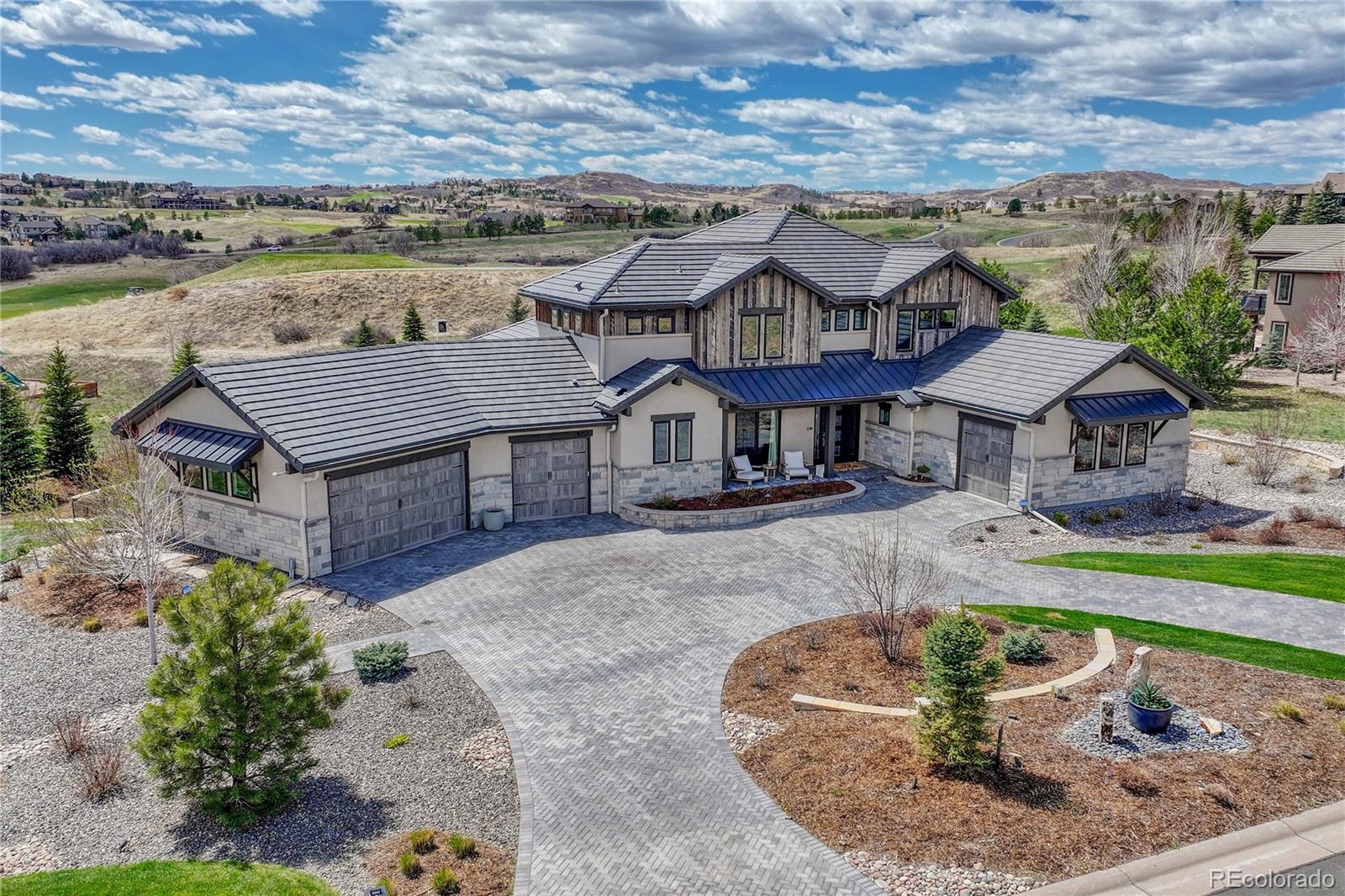 5151 Raintree Circle Parker, CO 80134 - Photo 1 of 50 an aerial view of a house with a garden