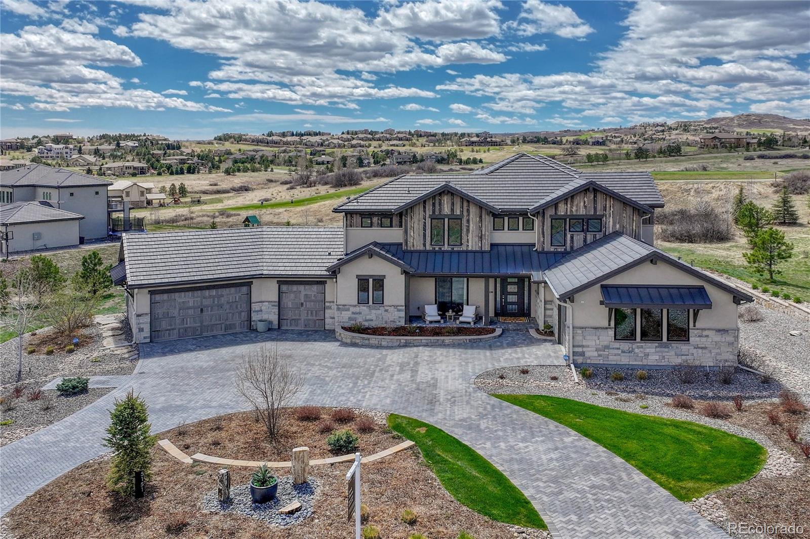 5151 Raintree Circle Parker, CO 80134 - Photo 2 of 50 a aerial view of a house with a yard