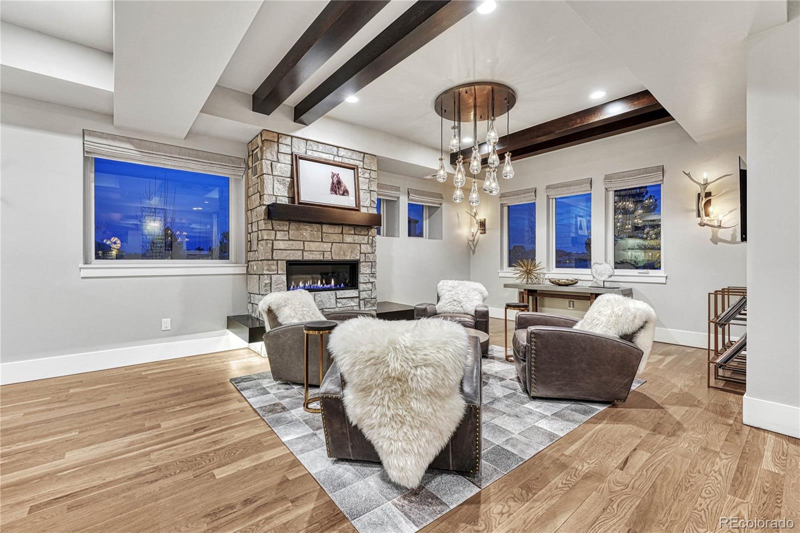 5151 Raintree Circle Parker, CO 80134 - Photo 28 of 50 a living room with furniture and a fireplace