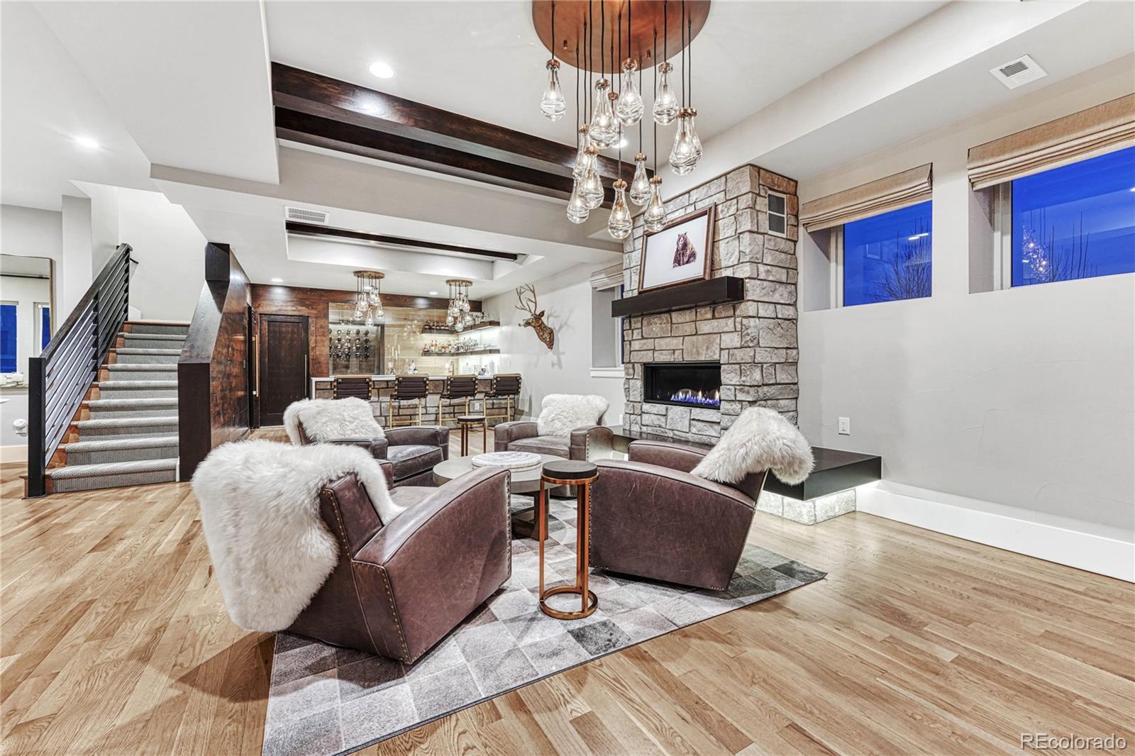 5151 Raintree Circle Parker, CO 80134 - Photo 30 of 50 a living room with furniture and a fireplace