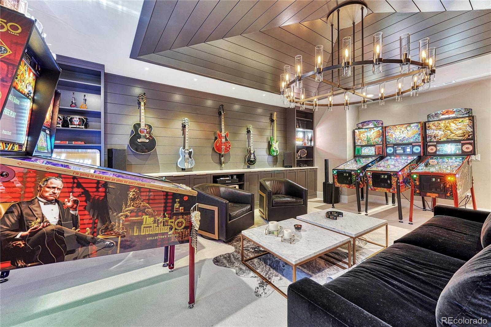 5151 Raintree Circle Parker, CO 80134 - Photo 37 of 50 a view of a dining room with furniture a chandelier and kitchen view